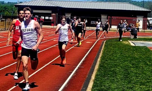 Oxford&rsquo;s Matt Tippets runs to victory in the 800-meter dash Wednesday, completing a sweep of the three individual distance events in the Calhoun County meet. He set a new record in the 1,600 and was named the most valuable athlete of the boys&rsquo; meet. (Photo by Joe Medley/East Alabama